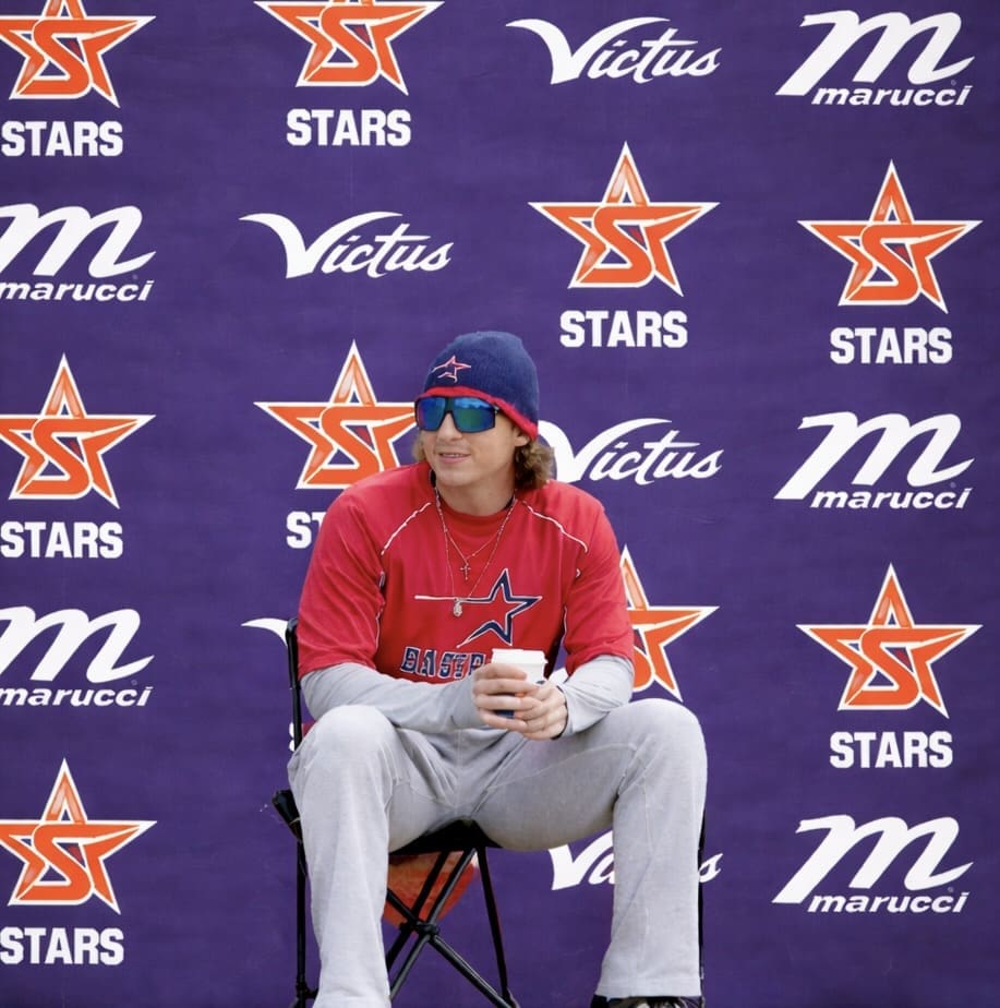 Baseball coach in relaxed pose